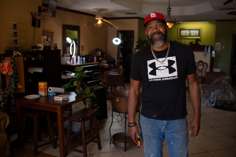 Barber Garrett Milton in his shop in Fort Valley