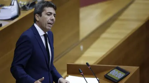 EPA-EFE/REX Valencia's regional President Carlos Mazon speaks at the Regional Parliament about the floods that hit on 29 October