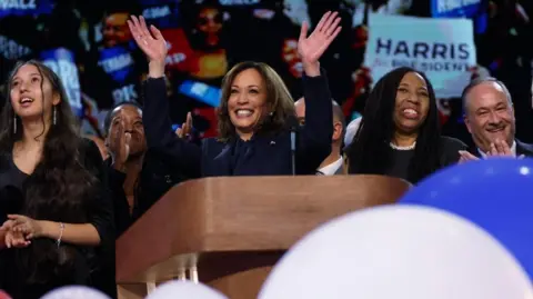 Reuters Democratic presidential nominee and U.S. Vice President Kamala Harris waves from the stage on Day 4 of the Democratic National Convention