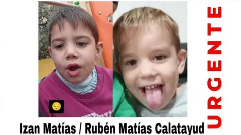 Family handout A "missing" poster showing two photos of Izan and Rubén Matías, with their names written underneath in black text and "urgente" written in red at the side.