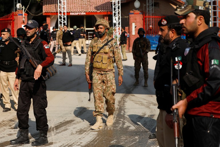 Military soldiers and police officers stand guard, after a suicide blast in a mosque in Peshawar, Pakistan January 30, 2023. REUTERS/Fayaz Aziz