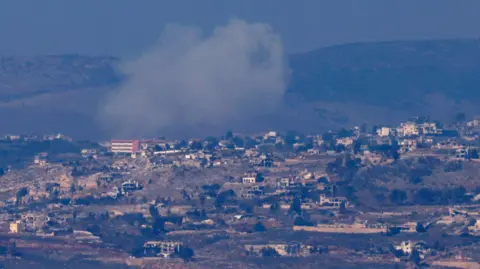 AFP Smoke billows from the southern Lebanese town of Khiam during Israeli bombardment on 2 December 2024, as seen from northern Israel (AFP)