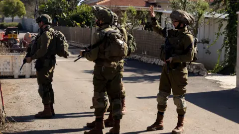 Getty Images Israeli soldiers in northern Israel. Photo: 2 December 2024