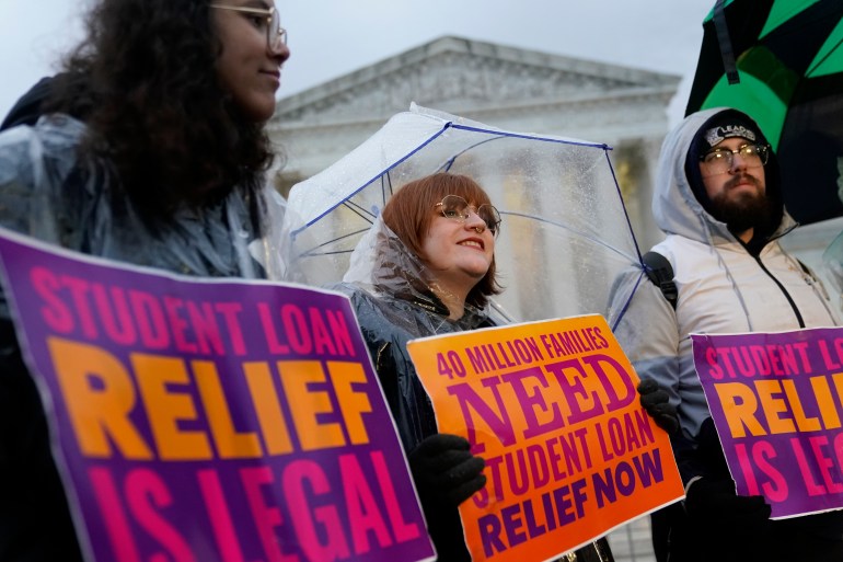 Student debt relief advocates gather outside the Supreme Court on Capitol Hill in Washington