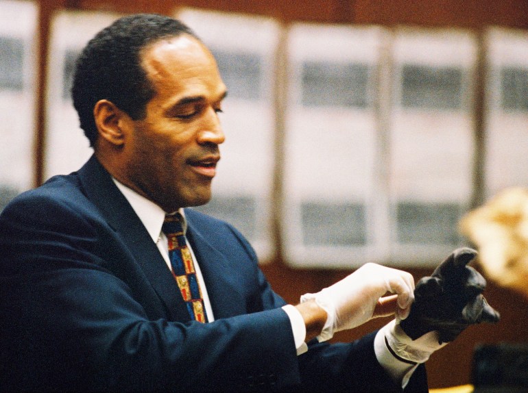 O.J. Simpson tired on glove during murder trial.