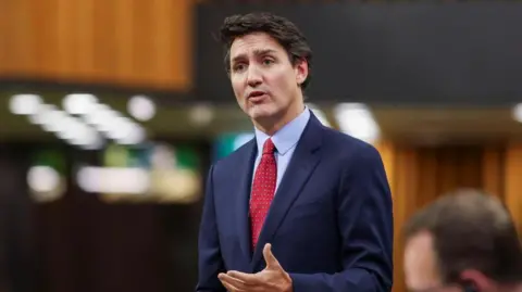 Reuters Canada's Prime Minister Justin Trudeau speaking in Parliament on 26 November, 2024