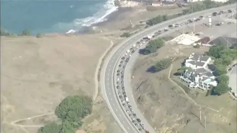 Reuters An aerial shot of vehicles on a highway near the coast in San Francisco as people rushed to get to higher ground before the tsunami warning was cancelled.