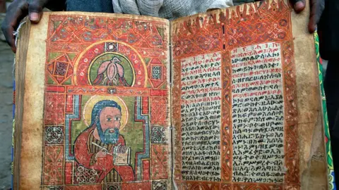 Getty Images A beautifully illustrated manuscript preserved at the Monastery of San Pantaleo in Aksum, Ethiopia